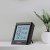 AC Infinity Smart Hygrometer B2 - higrometr ustawiony na podstawce
